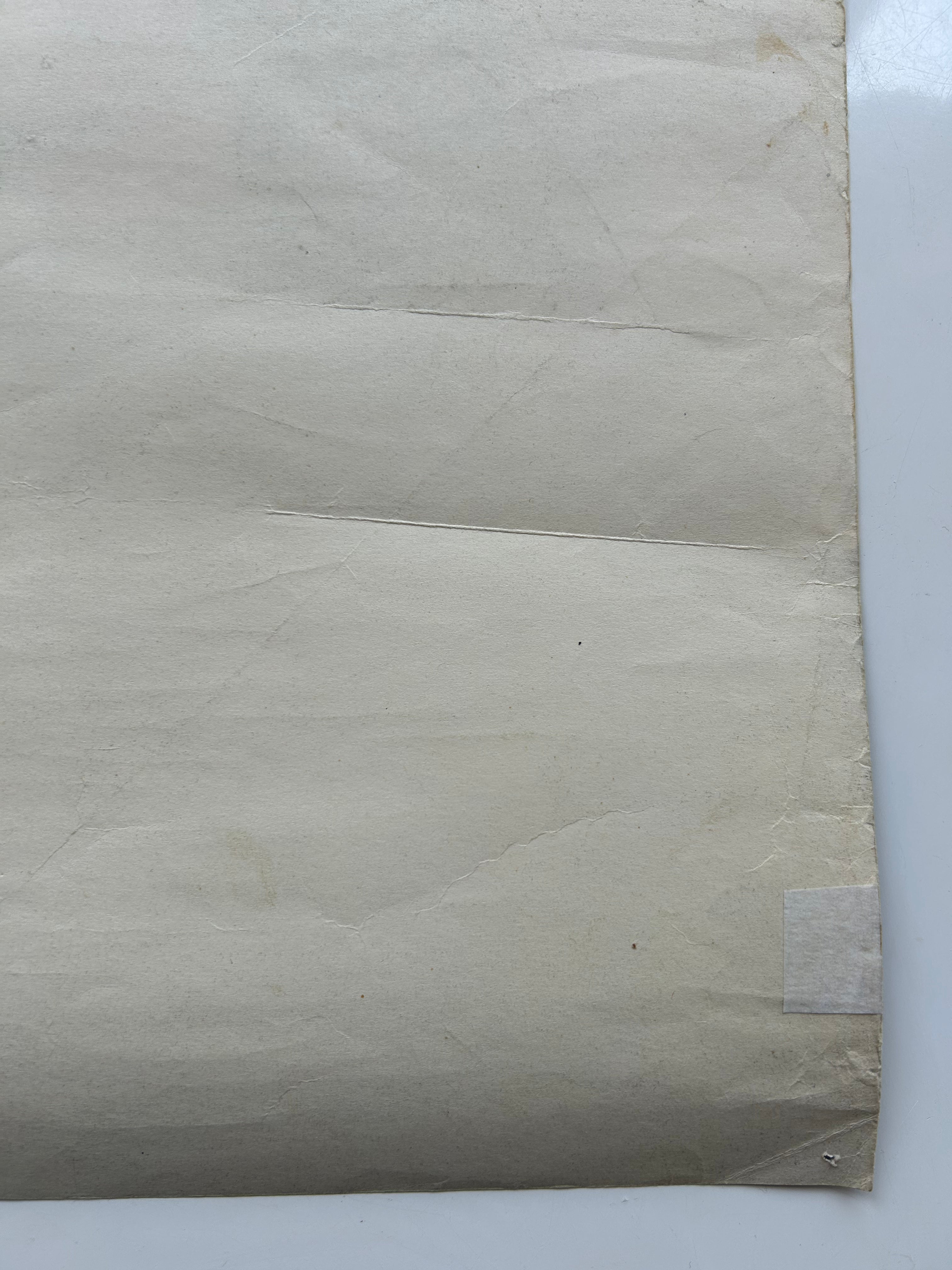 Close-up of a textured beige fabric on a white background