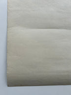 Sheet of gray paper on a white background