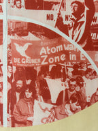 A close-up of a printed collage or poster featuring multiple historical protest scenes in a monochrome red and cream color scheme, with visible banners and faces.
