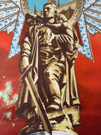 A large vintage-style poster or print featuring a bronze-toned statue of a soldier carrying a child, set against a bold red background with blue and white decorative elements and a small building silhouette at the top.