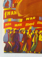 A close-up of a colorful vintage-style poster or print showing stylized human figures and repeated red banners with yellow text reading '1 MAY' and 'MAI'.