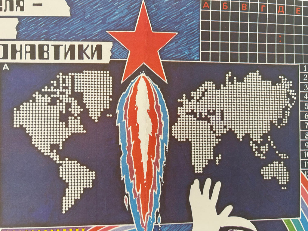 A close-up of a Soviet-themed diamond painting or cross-stitch pattern featuring a red star, a stylized rocket, world maps, Cyrillic text, and a hand outline on a dark blue background.