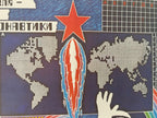A close-up of a Soviet-themed diamond painting or cross-stitch pattern featuring a red star, a stylized rocket, world maps, Cyrillic text, and a hand outline on a dark blue background.