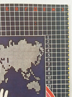 A close-up of a printed chart or poster showing a stylized world map made of white dots on a dark navy background, with a black grid and red/orange Cyrillic letters at the top and white numbers 1 through 12 along the right side.
