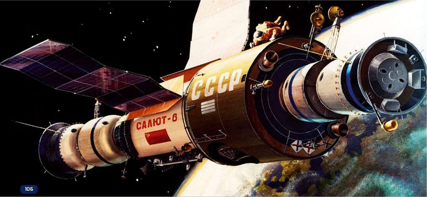 A space capsule or satellite module with Russian text markings, shown in outer space with Earth in the background. The capsule has gold, white, and dark purple sections with solar panels and small figures visible near the top.